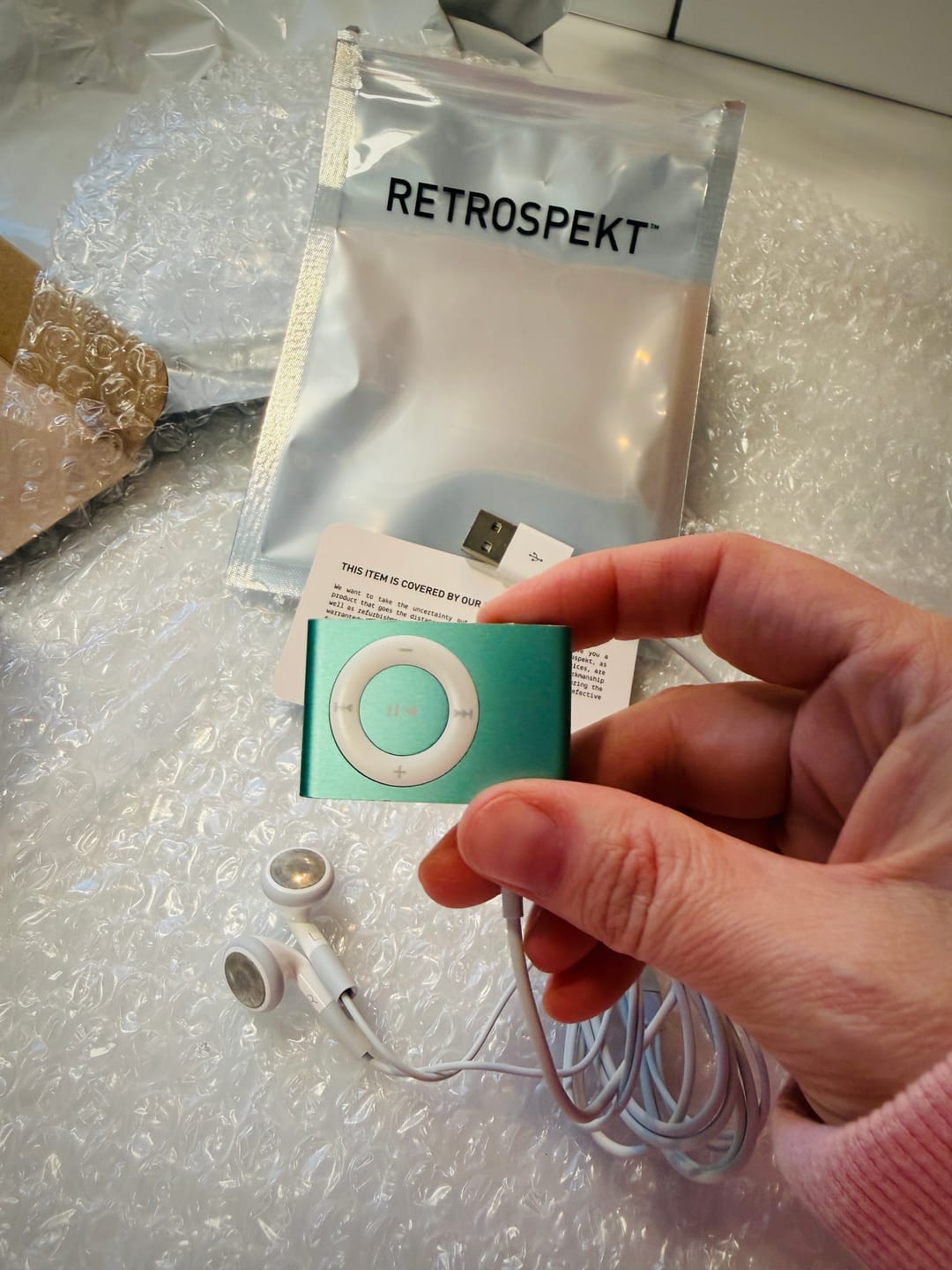 Customer photo review of Apple iPod Shuffle (2nd Generation) 1GB MP3 Player