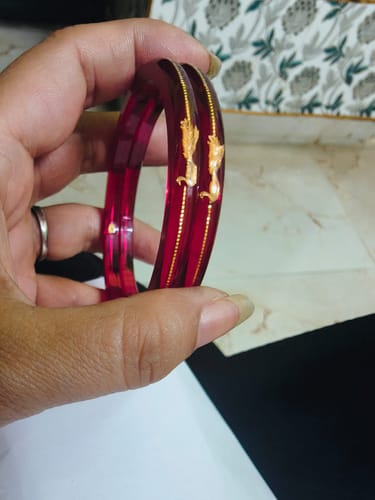 Customer photo review of “Light Red - A Divya Shringar Bangle” (2 pis) (Transparent Red)