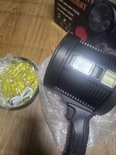 Customer photo review of Rechargeable LED Spotlight Flashlight – 900000 Lumens, Solar & USB