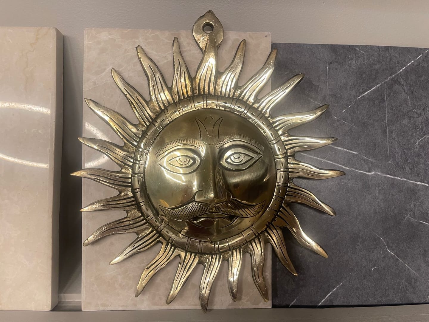 Customer photo review of Brass Surya (Sun) Ji Wall Hanging Idol Vastu Remedy for East Direction Balance, Fame and Positive Energy | 24 X 24 cm | 1 kg