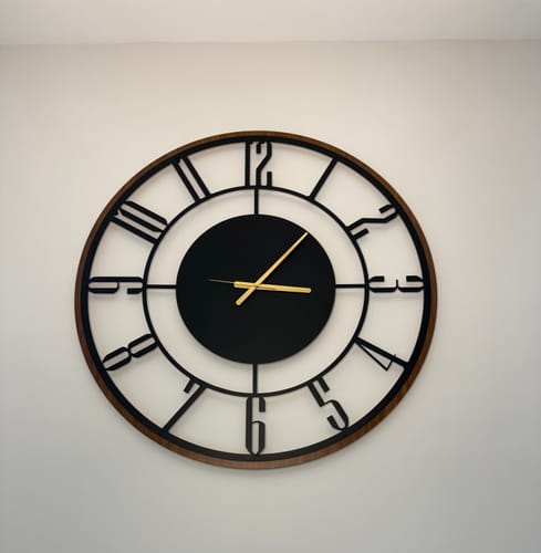 Customer photo review of METAL WALL CLOCK with Wooden Corners