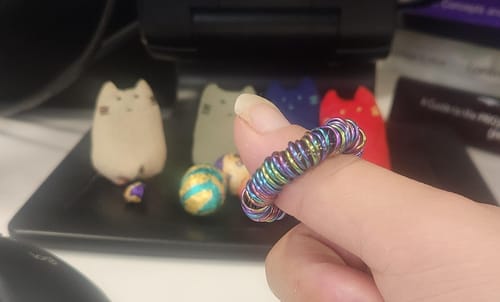 Customer photo review of Oil Slick Small Centipede Stainless Steel Fidget