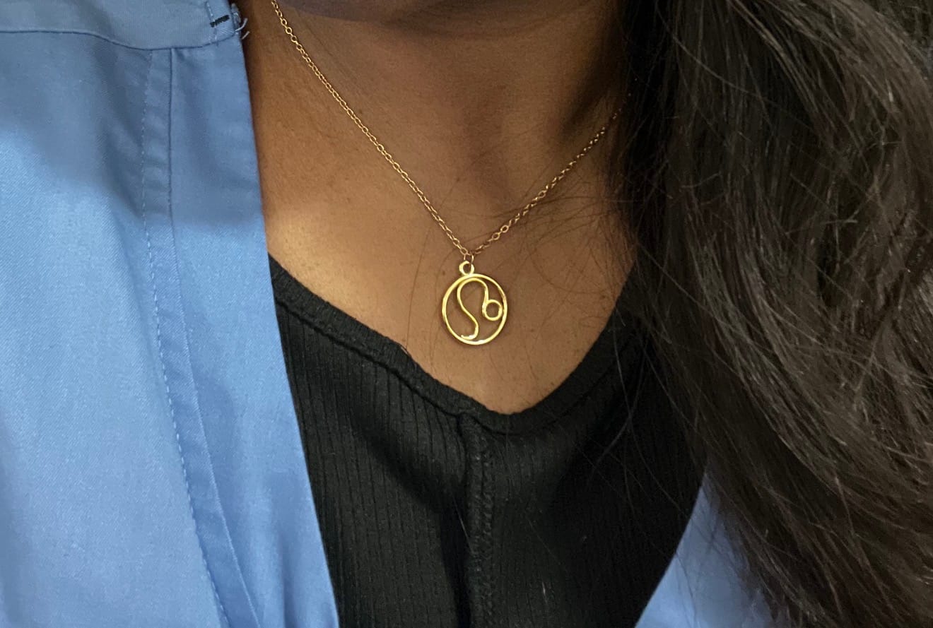 Customer photo review of Zodiac Sign Pendant Necklace