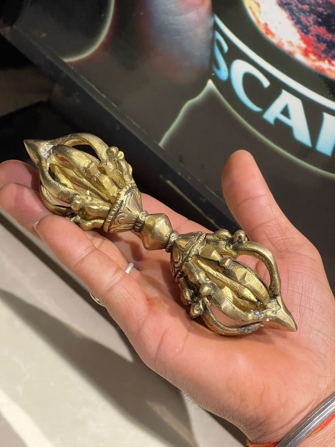 Customer photo review of Brass Vajra Dorje Ritual Tool Vastu Remedy for Protection, Tibetan Meditation and Home Temple Energy 15.7 x 4 cm | 340 gm