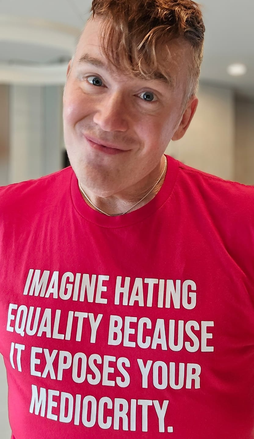 Customer photo review of Racism Is the Only Invention White People Won’t Take Credit For Unisex Tee