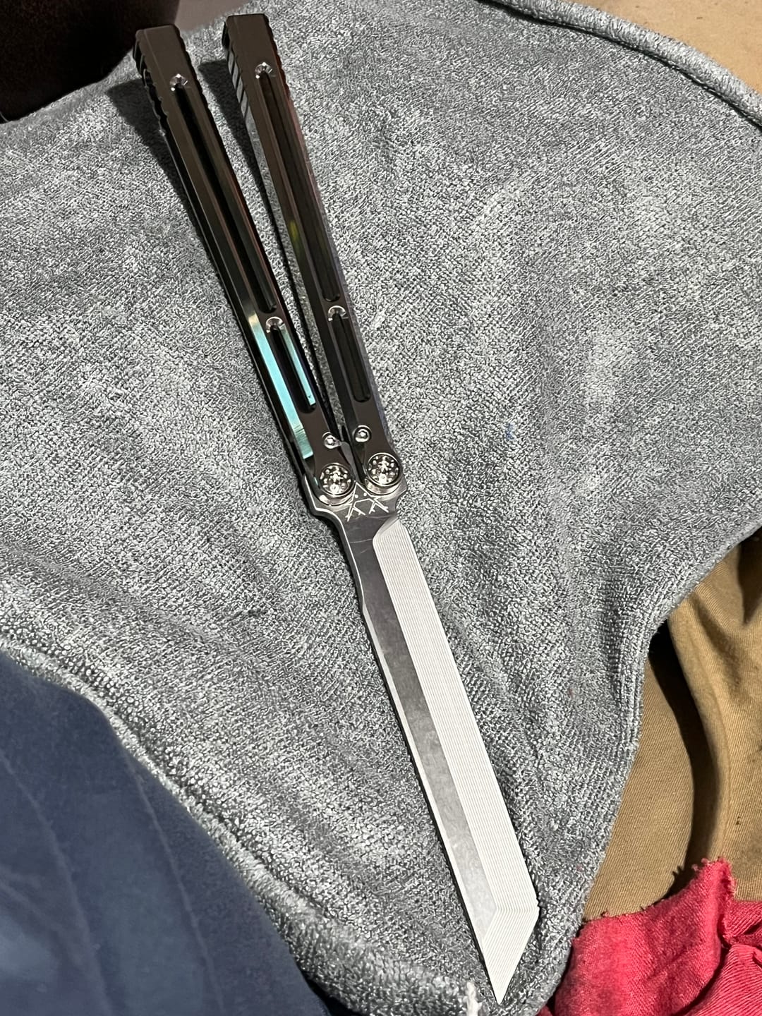 Customer photo review of Baliplus Telesto Balisong Titanium Alloy Handle+VG10 Stainless Steel Blade Bushing