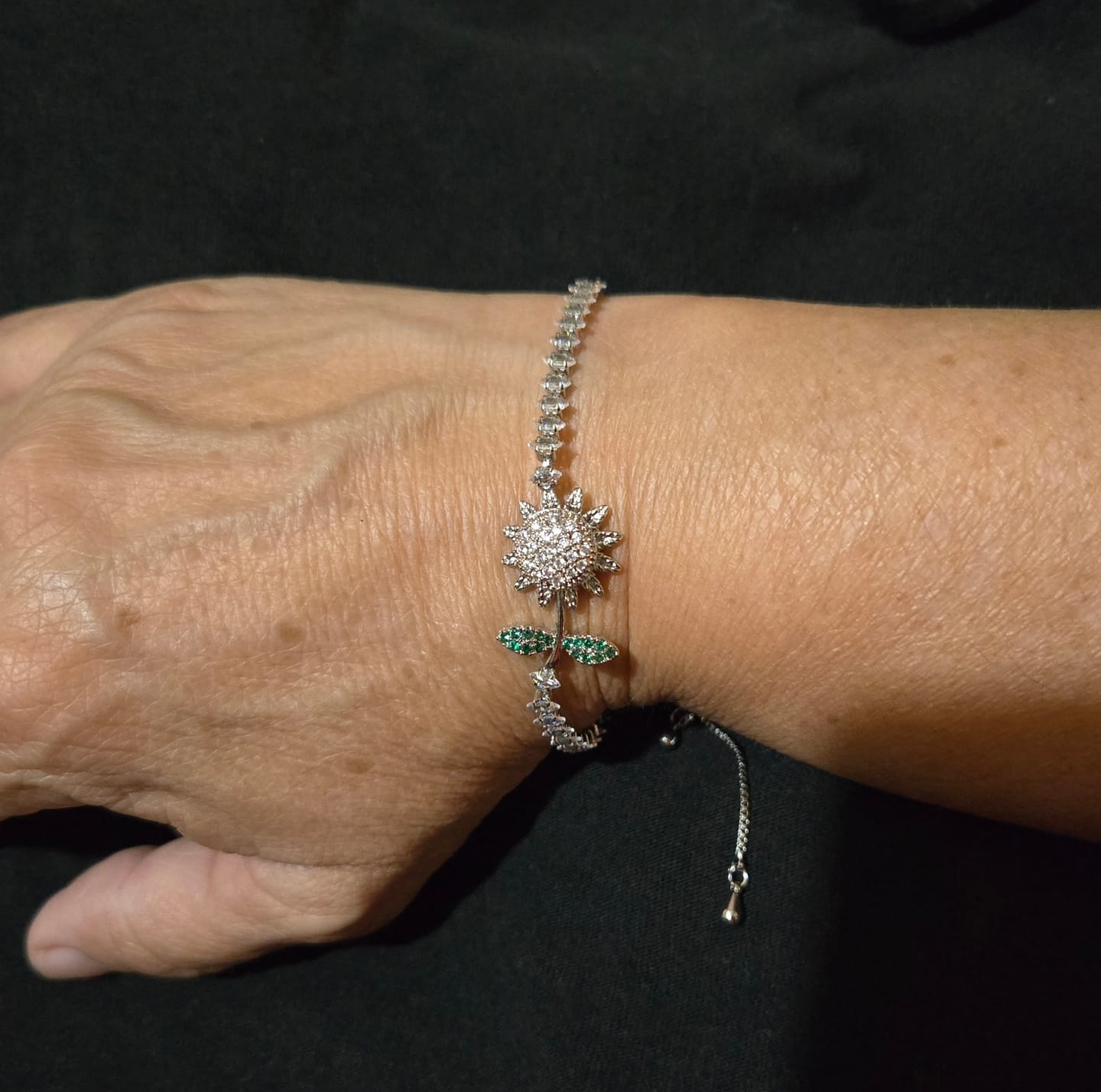 Customer photo review of Pulsera Girasol Giratoria