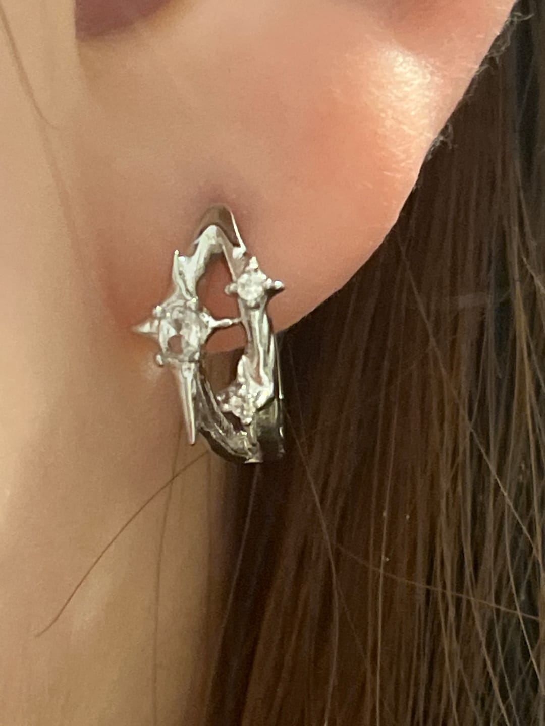 Customer photo review of "Star Trails" 925 Sterling Silver Dainty Four-Pointed Star Stud Earrings, Celestial Jewelry