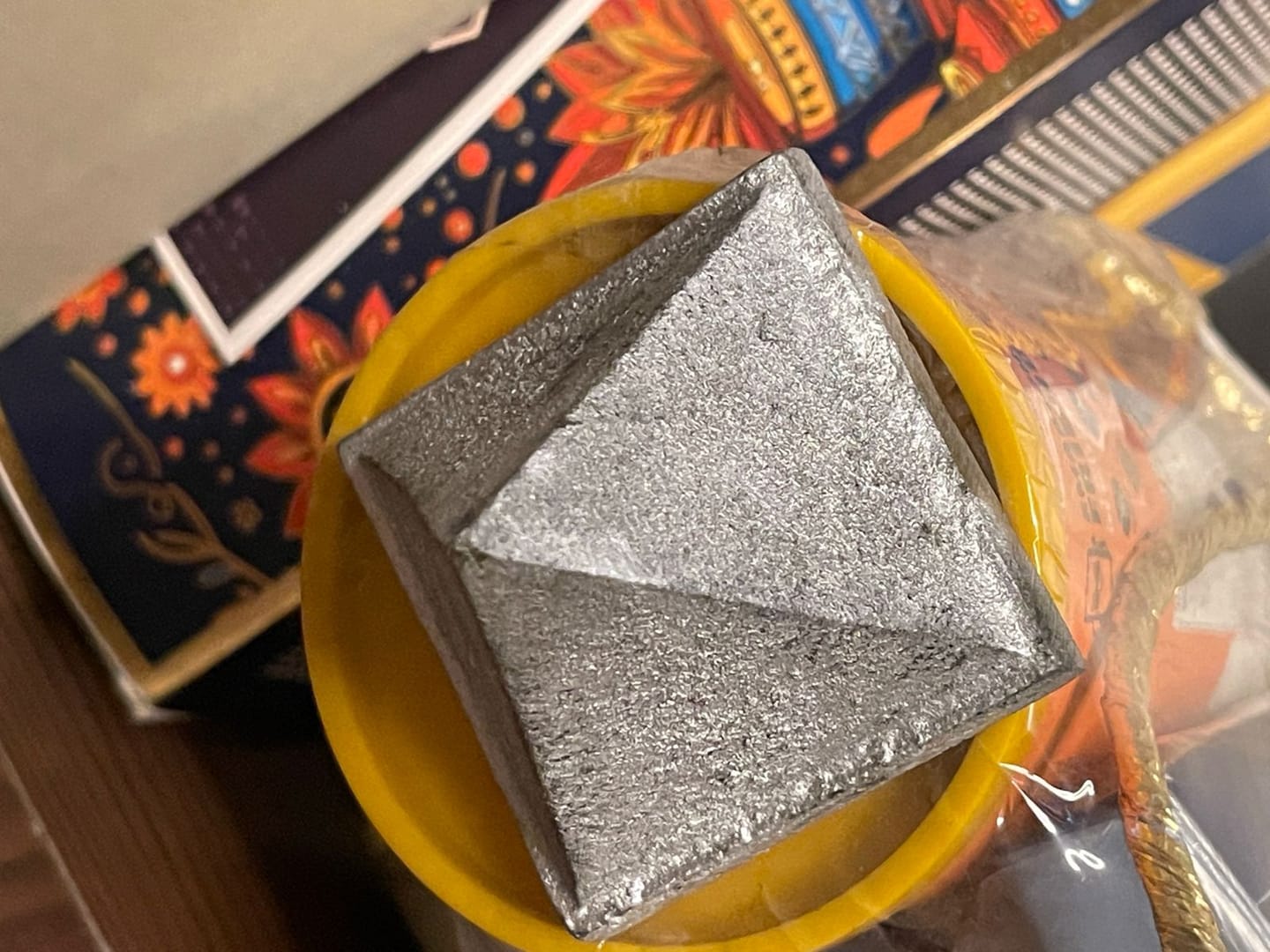 Customer photo review of Solid Iron Metal Pyramid Vastu Remedy for West Direction and Brahmasthan Balance, Mental Focus, Career Success and Positive Energy Correction | 7.6 cm | 800 g