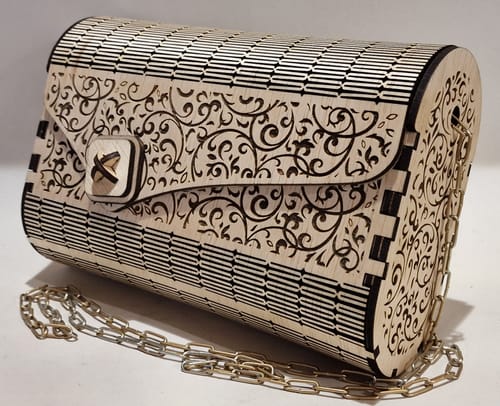 Customer photo review of Wooden clutch handbag purse laser cut svg file