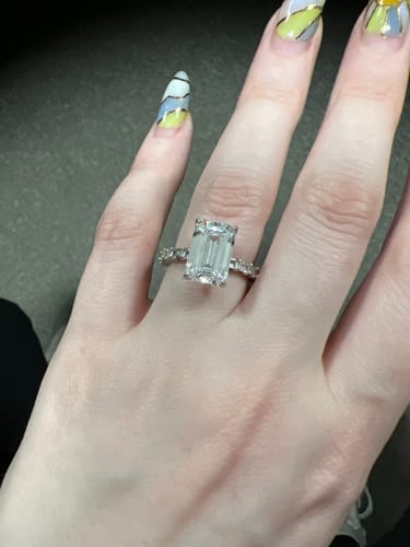 Customer photo review of 5.5Ct Emerald Cut Hidden Halo Engagement Ring Travel Ring In Sterling Silver
