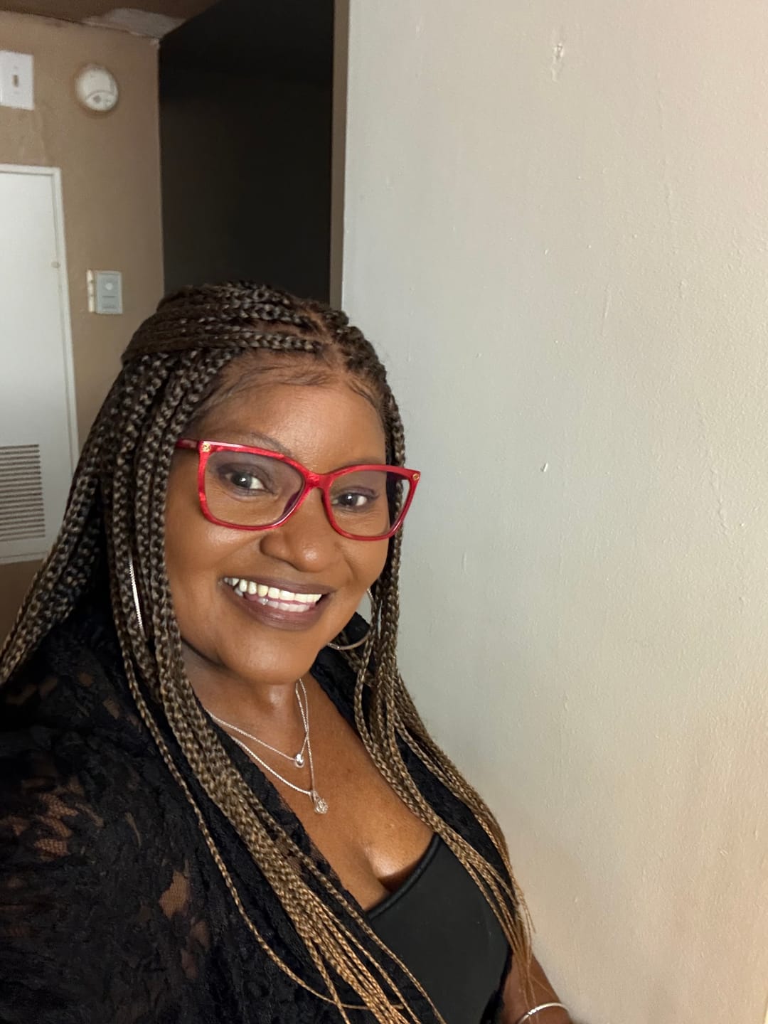 Customer photo review of Kora - Pre Bleached Human Hair Lace Lightweight Knotless Swiss HD Lace Box Braided Wig 100 Strands