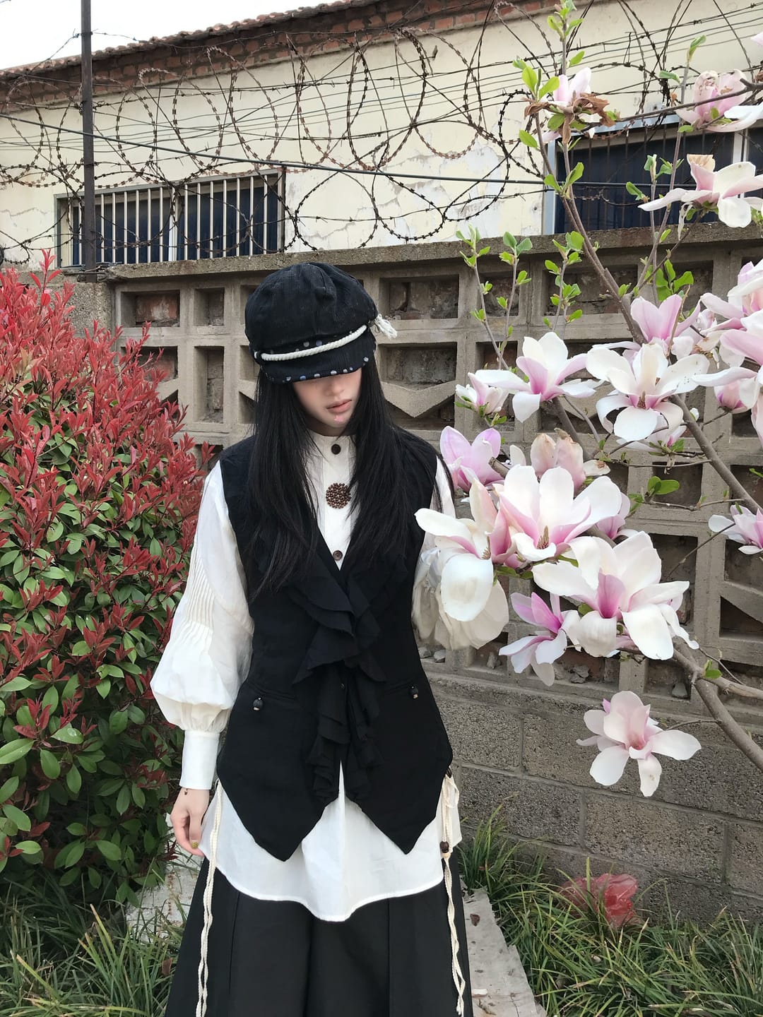 Customer photo review of DOINDULGE Ruffled Tie Deconstructed Vest