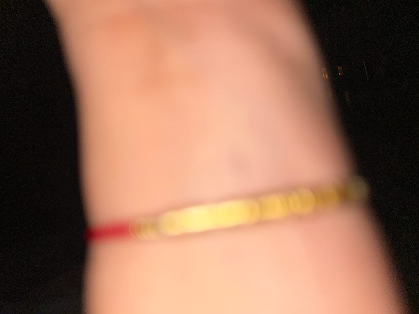 Customer photo review of 24K Gold Red String Bracelet – Handmade Tibetan Protection & Good Luck Jewelry with 999 Silver Mantra Charm