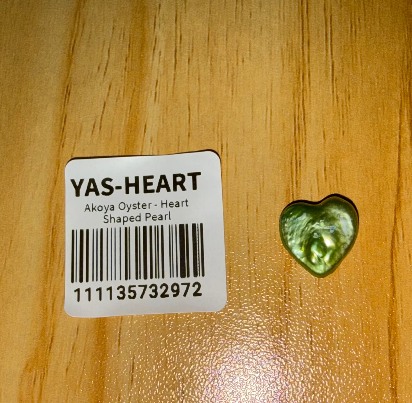 Customer photo review of Akoya Oyster - Heart Shaped Pearl