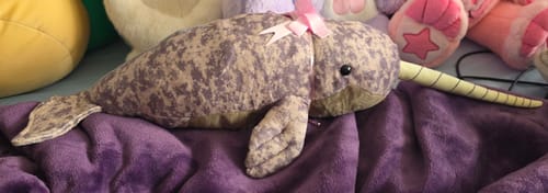 Customer photo review of Lifelike Narwhal Soft Stuffed Plush – The Magical Arctic Unicorn