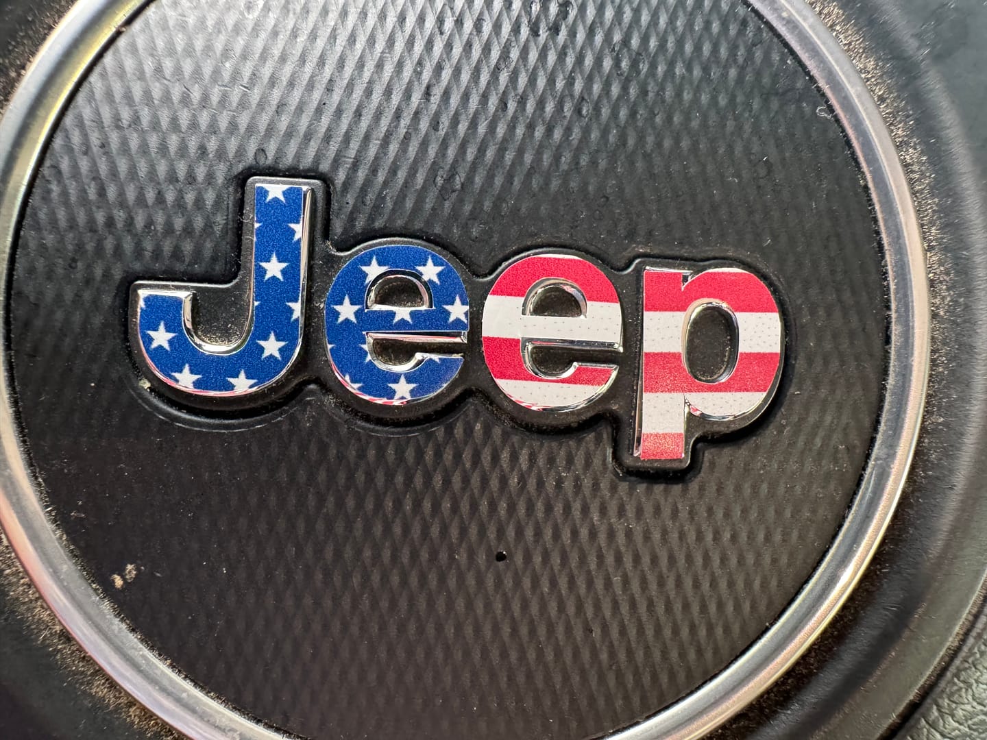 Customer photo review of JEEP Steering Wheel Emblem Overlay Decal — 30+ Colors & Designs (Flag, Topo, Animal, Solid)