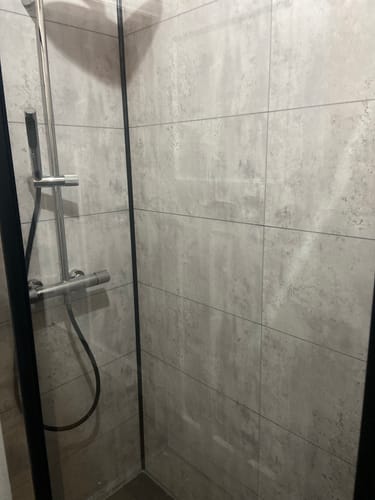 Customer photo review of Premium Grey Concrete Tile Matt Shower Wall Panel – 2.6M x 600MM