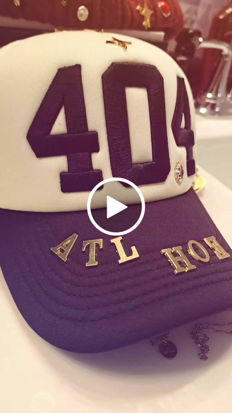 Customer video review of 404 Cream/BLK Trucker Hat