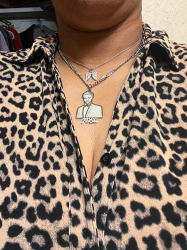Reviewer wearing the silver Custom Photo Engraved Pendant Necklace with an engraved portrait.