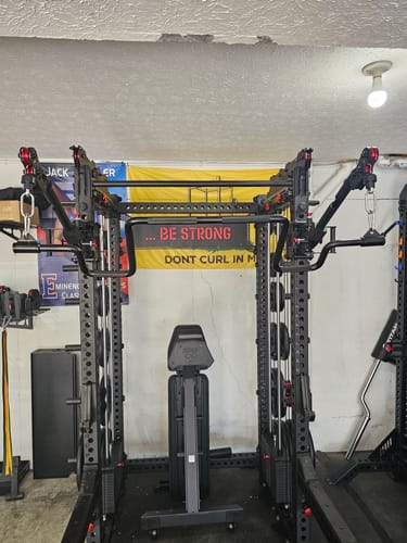 Customer photo review of THE ANDREONI BAR - A revolutionary cable machine attachment.