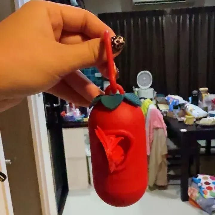 Customer photo review of Strawberry Poop Bag & Dispenser