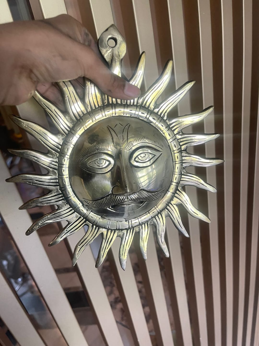 Customer photo review of Brass Surya (Sun) Ji Wall Hanging Idol Vastu Remedy for East Direction Balance, Fame and Positive Energy | 24 X 24 cm | 1 kg