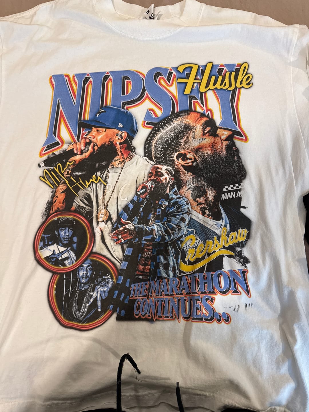 Customer photo review of Nipsey Hussle Tee