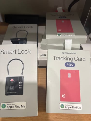 Customer's retail boxes for the SPOTMINDERS. Tracking Card PRO, showing the pink card on the front.