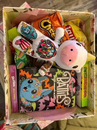 Customer photo review of Candy the Unicorn 8-inch Sprout Plushie