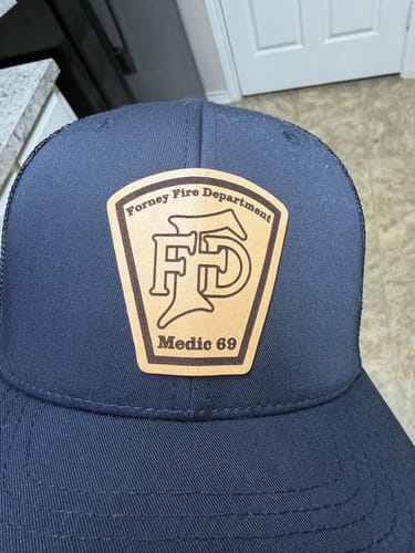 Customer photo review of Custom Leather Patch Trucker Hat - Richardson 112+