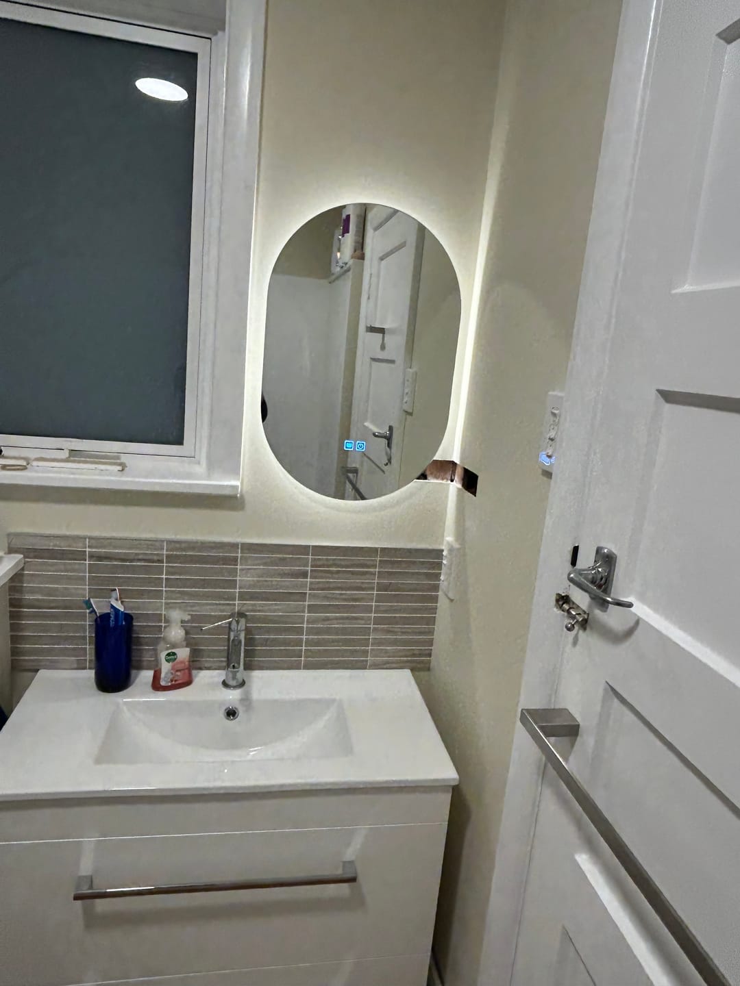Customer photo review of Premium Backlit Oval LED Mirror with Demister, 3 Colour Selections, Dimmable, 5-Year Warranty