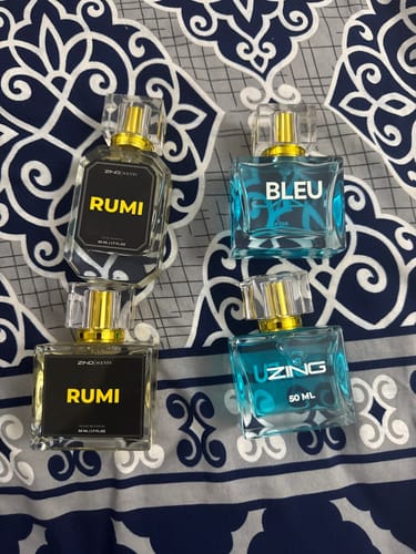 Customer's repeat order of the Deal of the Month, showing two Rumi and two Bleu De Zing perfume bottles.