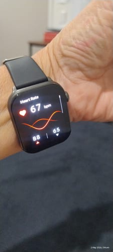 Customer's Gard Pro Health Smartwatch 3 on their wrist, displaying a heart rate of 67 bpm on the screen.