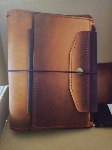 Customer photo review of Apple Pig Mix Traveler's Notebook (for cave art leather)