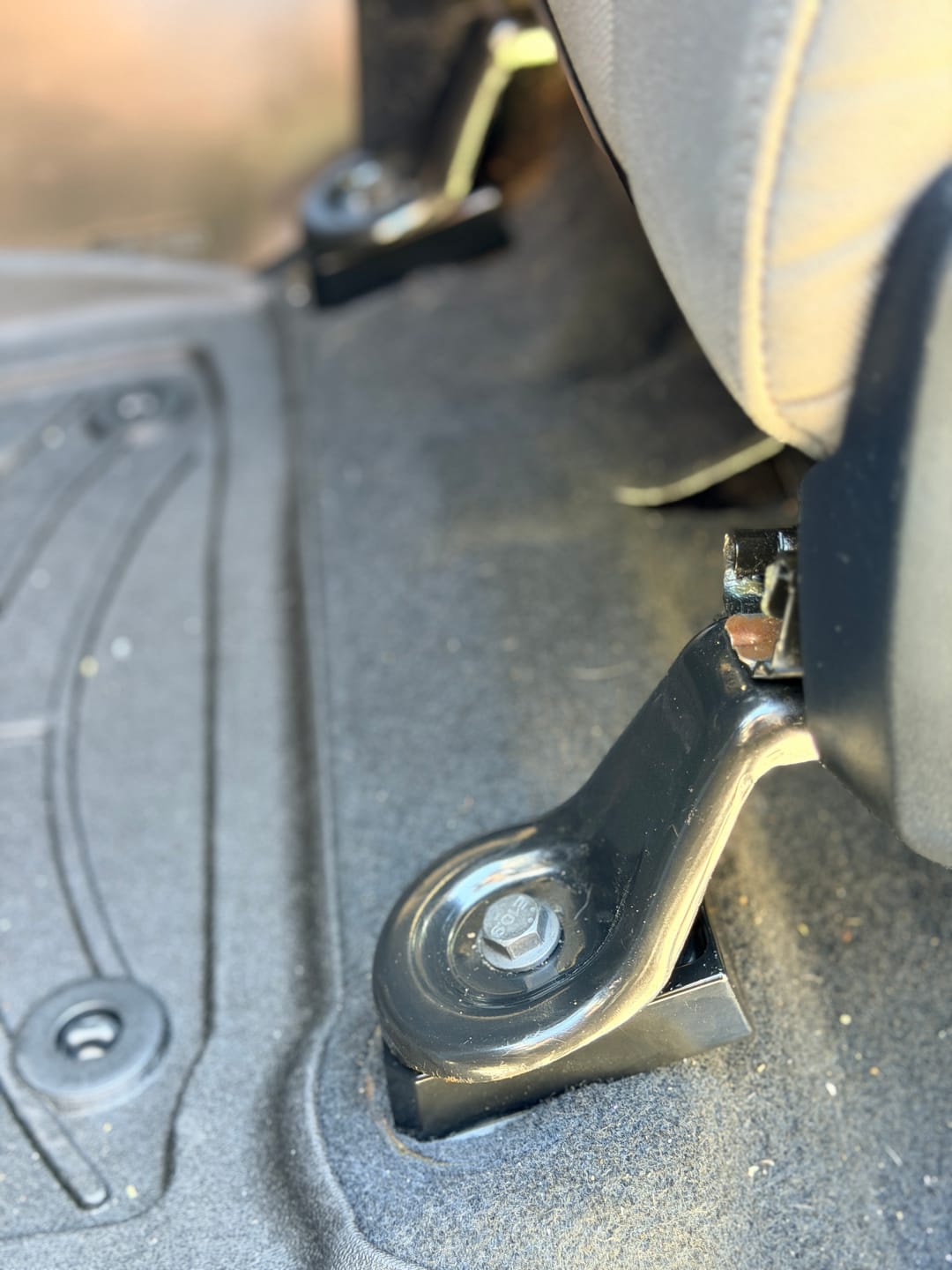Customer photo review of Premium Anti-Dust Seat Bracket Bolt Cover Trims for Toyota Tundra (2014-2021) - Set of 4