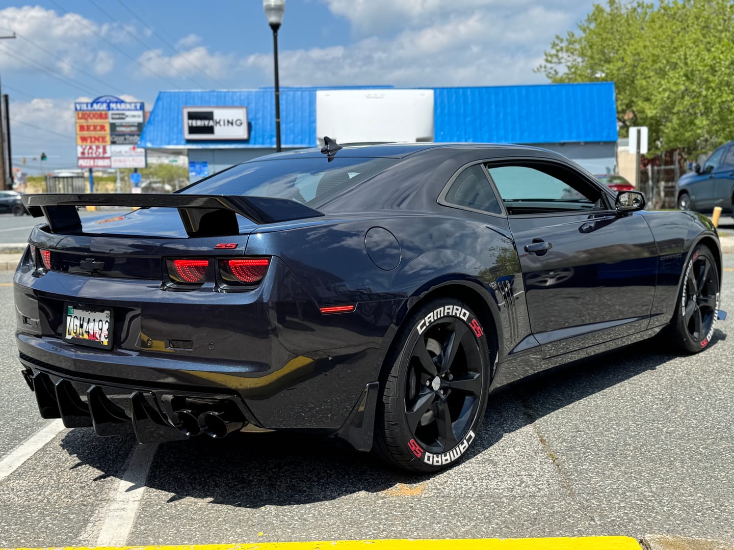 Customer photo review of 2010-2013 Chevy Camaro Evo Style Shark Fins Rear Diffuser Quad/Single Tips