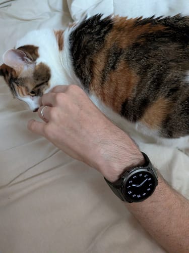 Customer's photo for a Shipping Insurance review, showing the delivered smartwatch on a person's wrist.