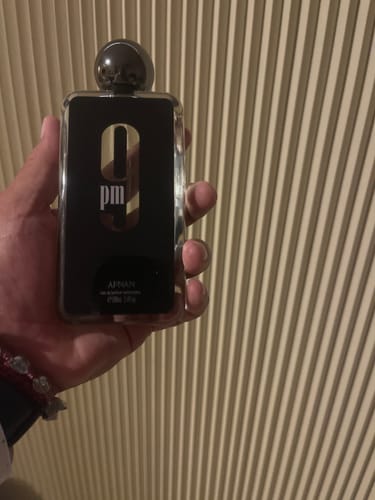Reseña con foto de un cliente sobre Perfume Afnan 9 PM EDP