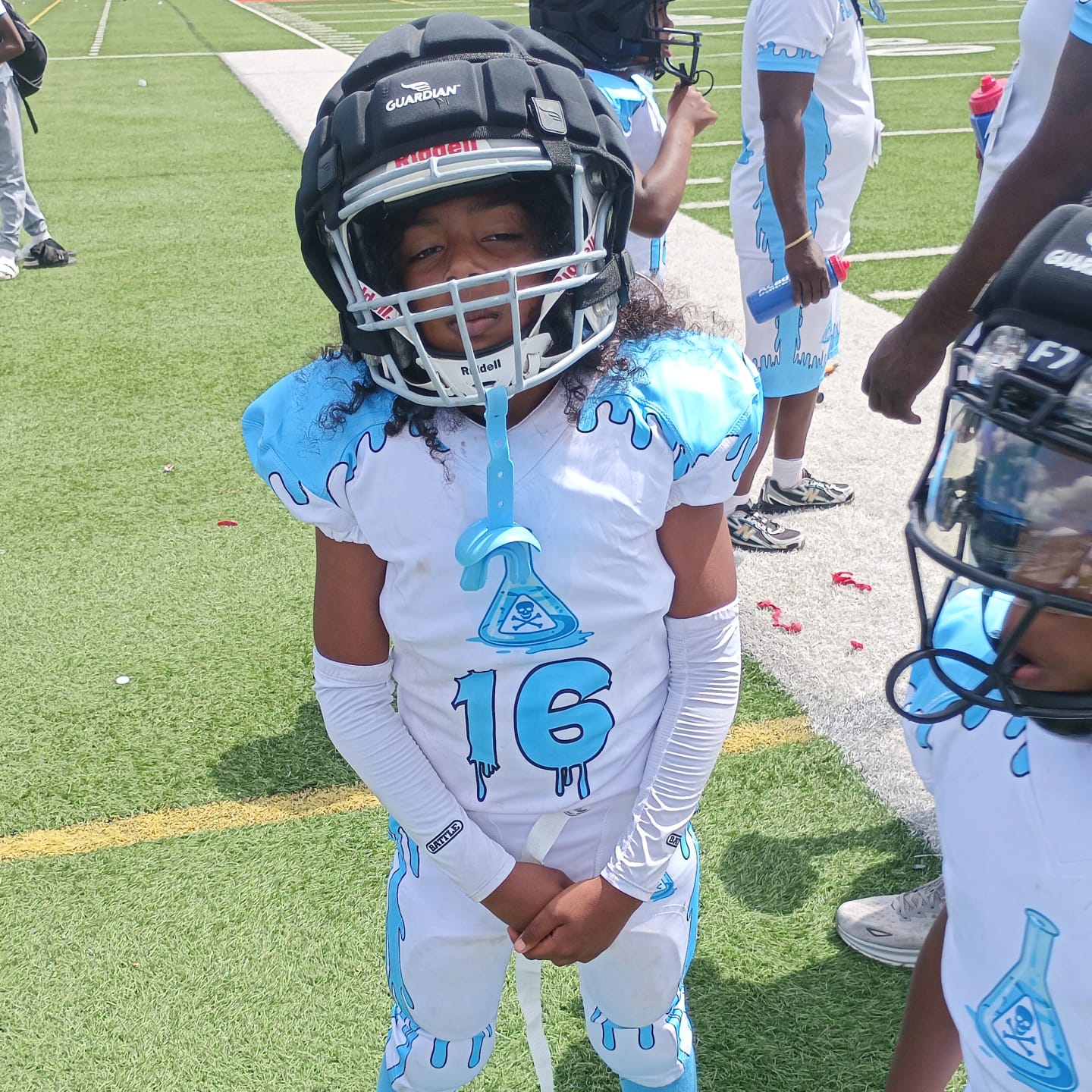 Customer photo review of Kool-Aid 'Mixed Berry' Football Cleats - Quantum Speed by Phenom Elite