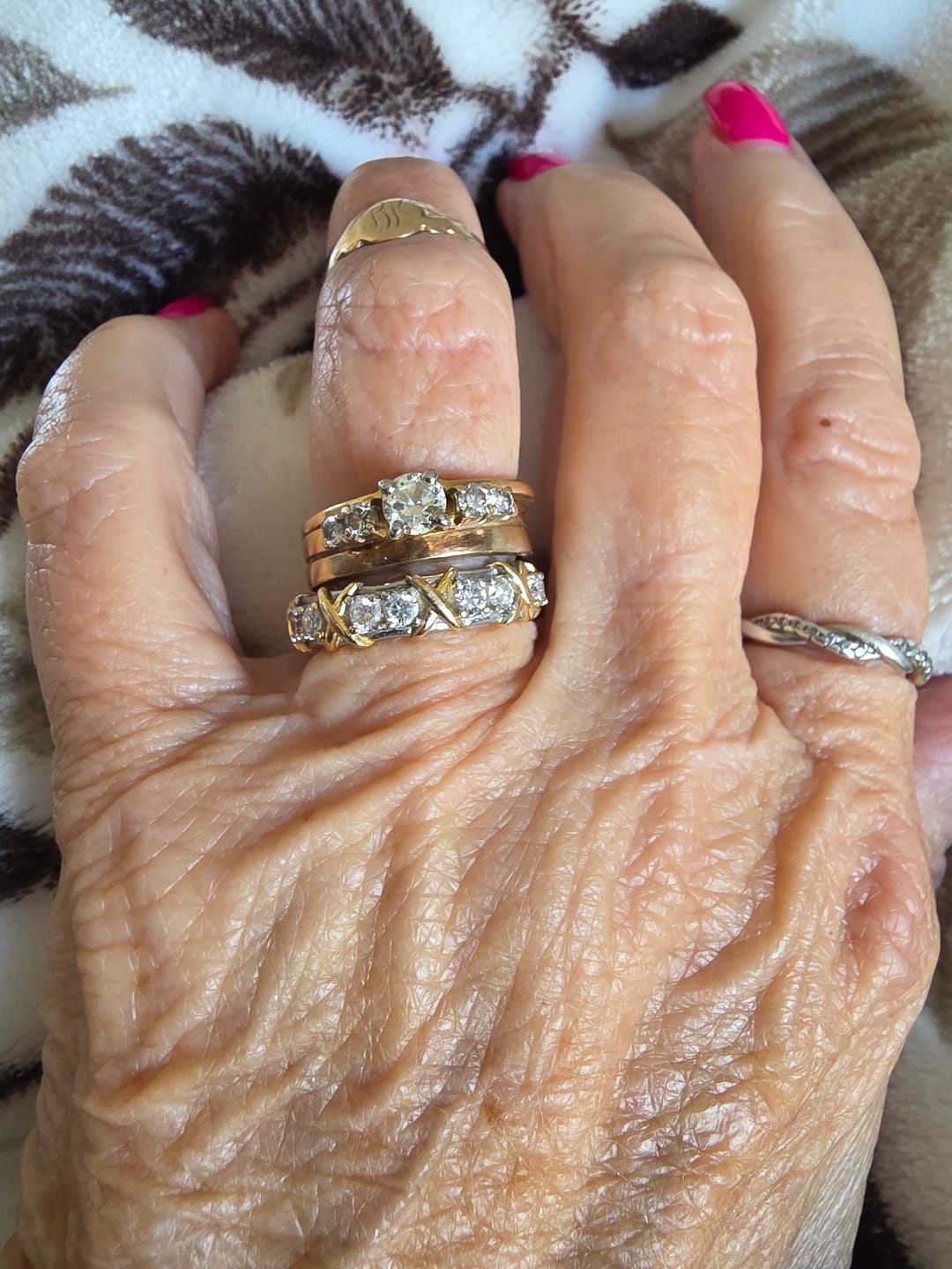 Customer photo review of Alternating Round Moissanite And Golden Xs Eternity Wedding Band Ring