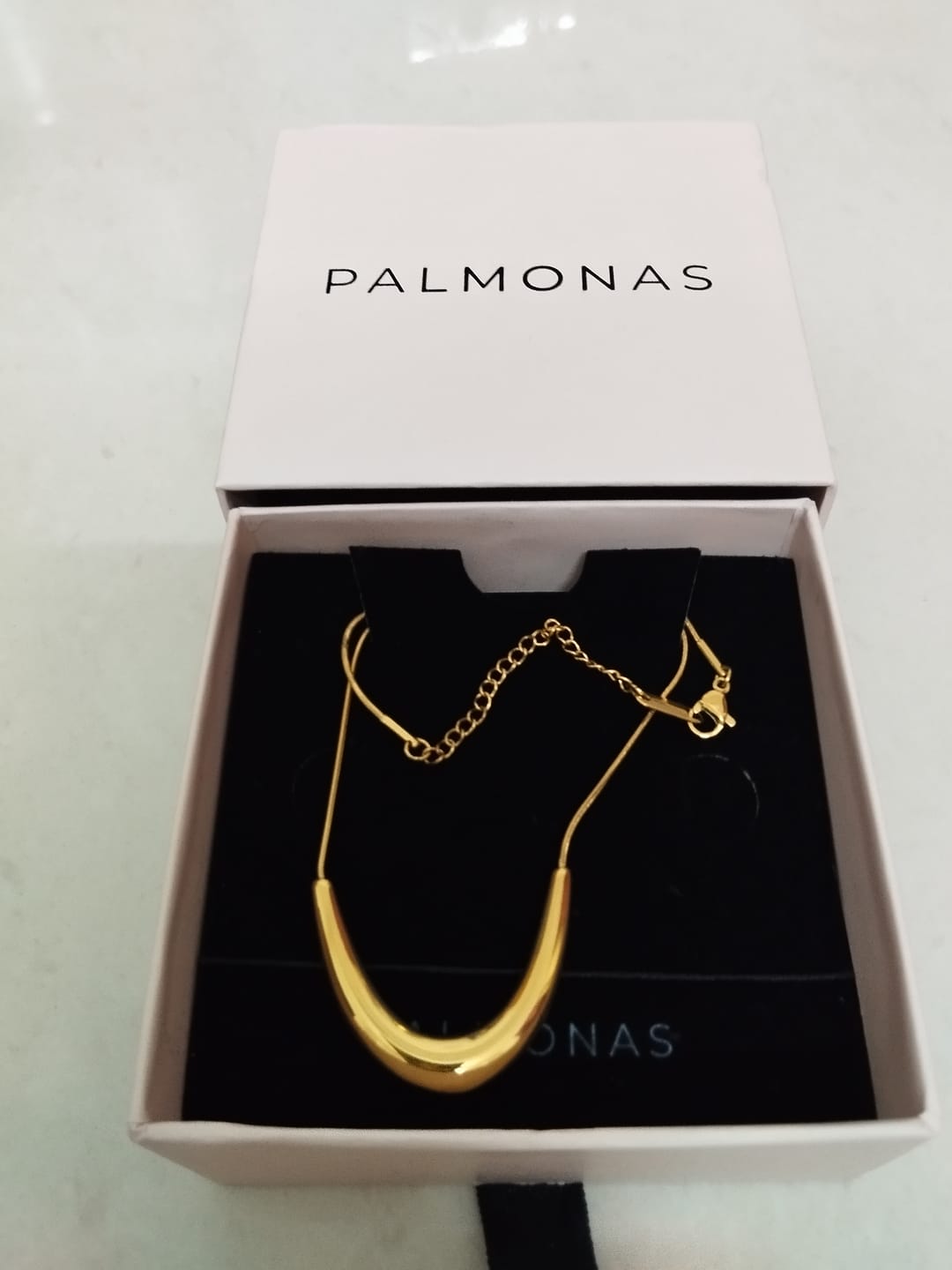 Customer photo review of Golden Boomerang Necklace