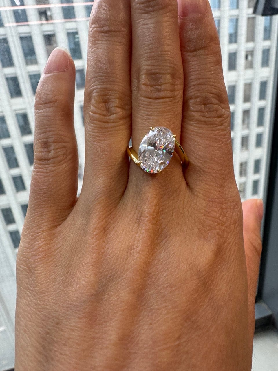 Customer photo review of S925 Moissanite 5.5Ct Oval Cut Unique Engagement Ring Travel Rings In Sterling Silver