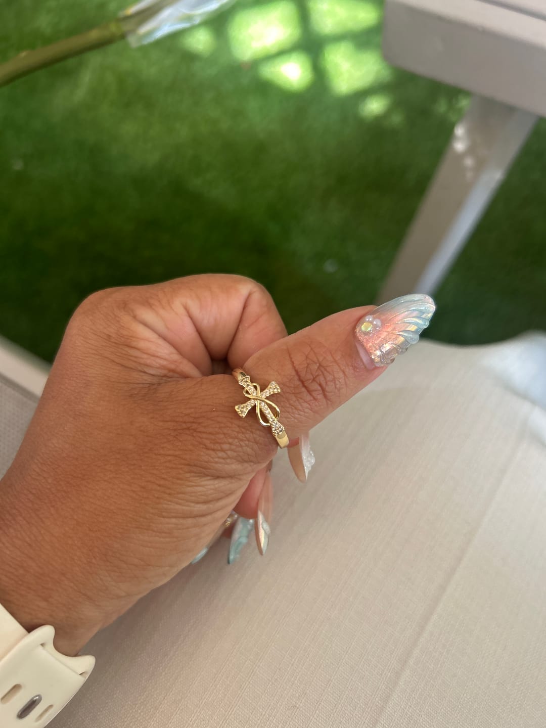 Customer photo review of Christianartworkshop Golden/Silver Mobius Cross Ring: Carry His Grace in Daily Wear