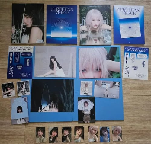 Customer's Red Velvet Wendy Cerulean Verge Photobook Album bundle set, with all inclusions like photocards laid out for display.