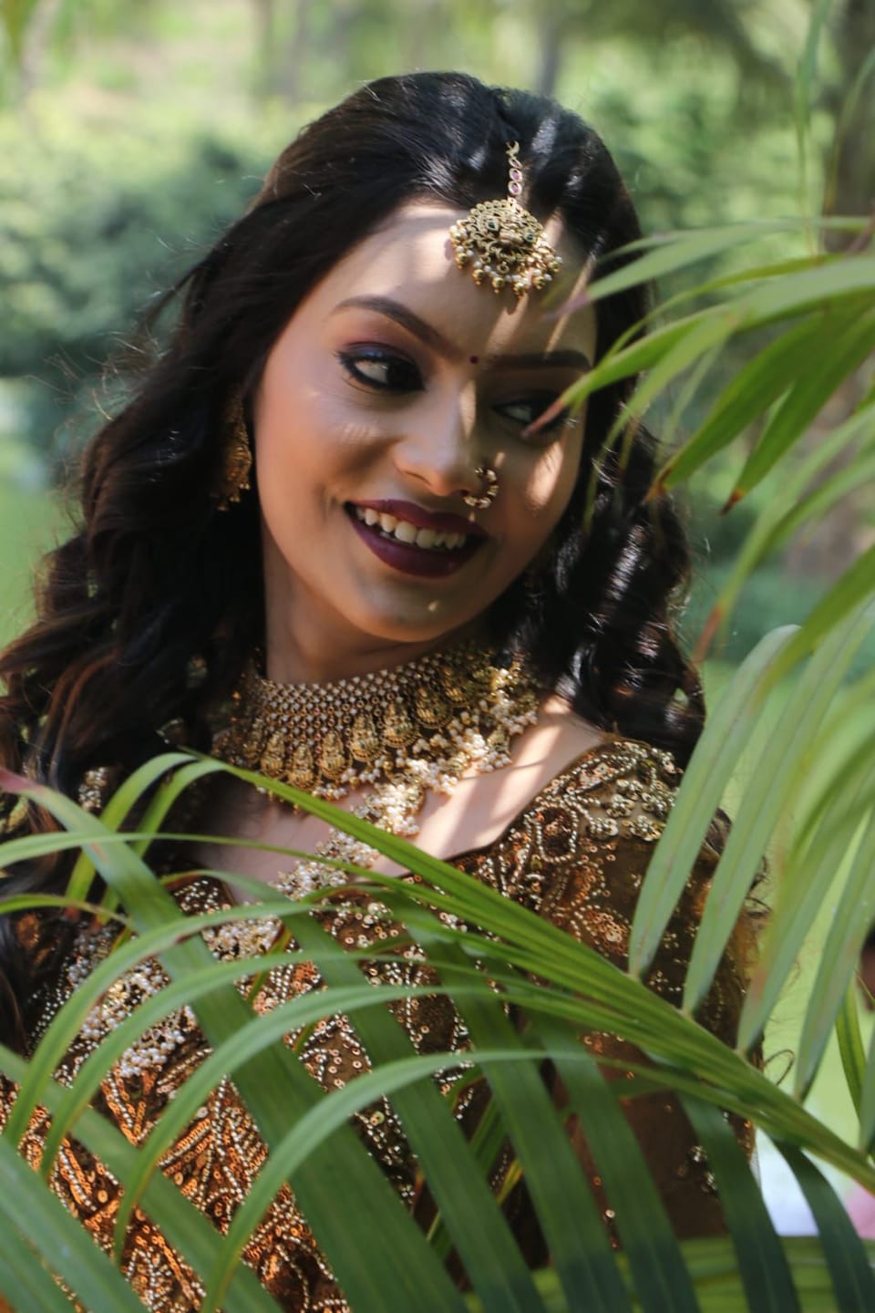 Customer photo review of Laxmiji motif's on mesh design stones studded choker with pearl and gold bead drops