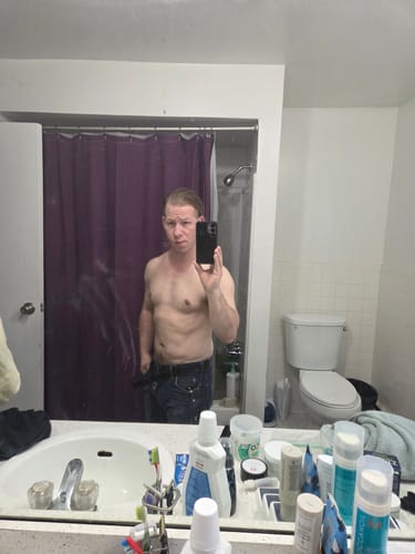 Reviewer's mirror selfie showing their physique after taking Primal Reindeer Testosterone Support.