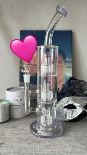 Customer's Trinity Triple Matrix Perc Water Pipe on a table, highlighting its clear glass and three percolators.