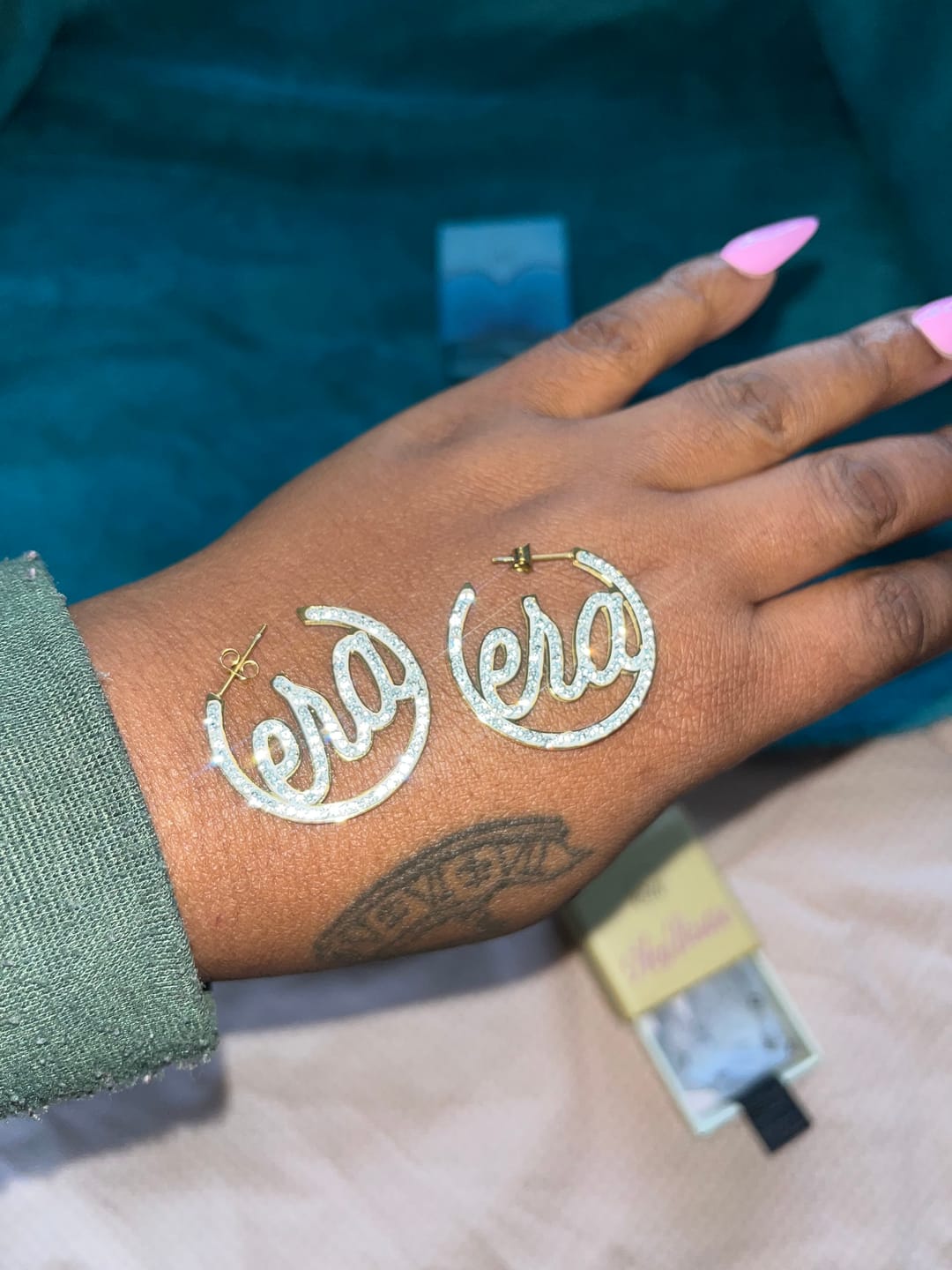 Customer photo review of Gold Luxe Mini Logo Hoops