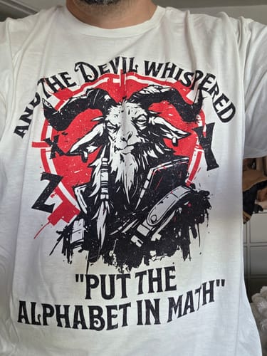Customer photo review of And The Devil Whispered T-Shirt